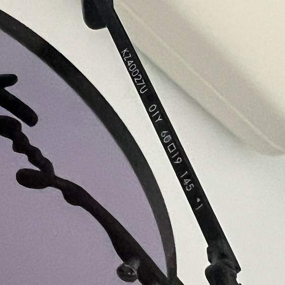 Kenzo Sunglasses with Black Frame and Purple Lenses